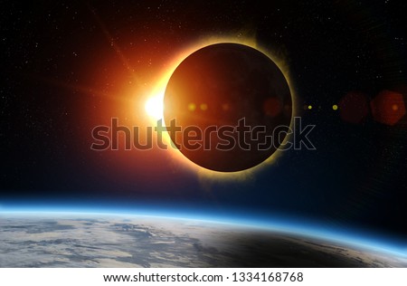 Solar Eclipse and Earth. Solar eclipse, mysterious natural phenomenon when Moon passes between planet Earth and Sun. Elements of this image furnished by NASA. Royalty-Free Stock Photo #1334168768