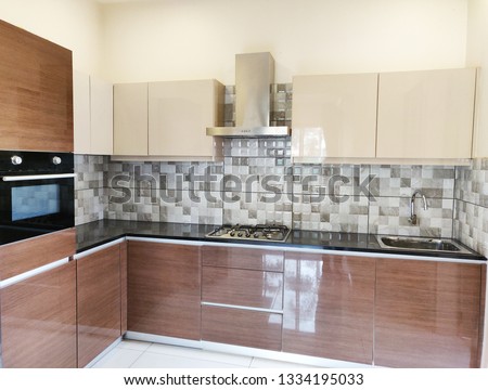 Interior design of modern domestic kitchen Royalty-Free Stock Photo #1334195033
