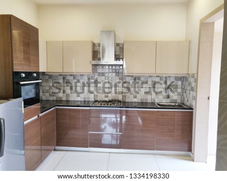 Interior design of modern domestic kitchen Royalty-Free Stock Photo #1334198330