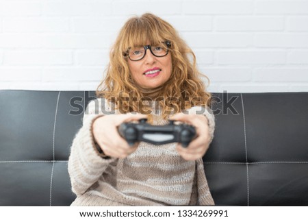adult woman playing video games