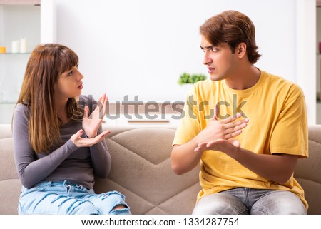 Woman and man learning sign language