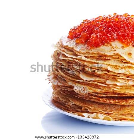 Pancakes with red caviar. Pile of pancakes. Pancakes on a plate. Red caviar. Royalty-Free Stock Photo #133428872