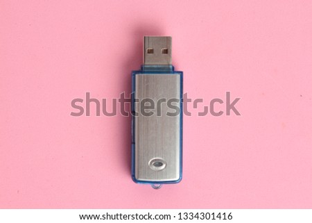 Side view of silver USB memory stick  on white 