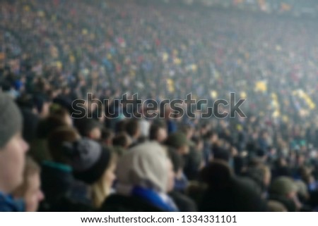 Blurred background of crowd of people at the stadium