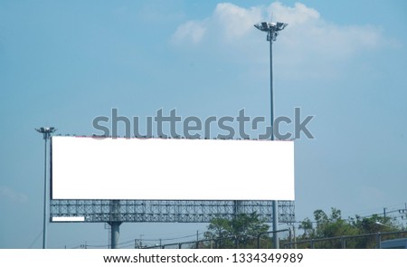 Blank billboard on blue sky background for new advertisement
