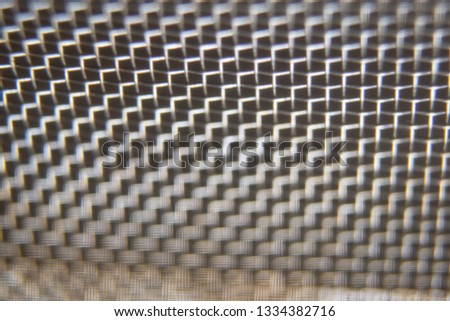Metal wire mesh background or texture. Closeup, macro.
