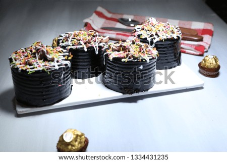 Tasty chocolate cake on table