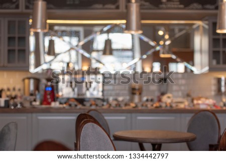 Blurred Picture of an Interior of a Cafe as Background, defocused photo of Restaurant 