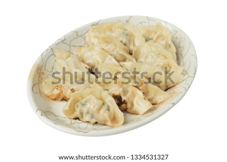 Picture of fried dumplings or gyoza isolated on white background