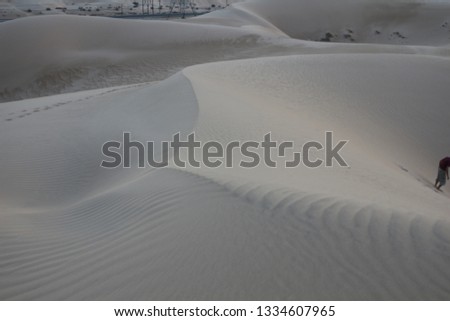Imperial Sand Dunes in California desert with waves of textures in the sand from the high fast winds
