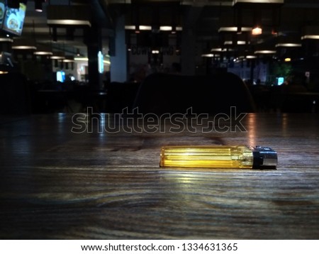 lighters on a wooden table