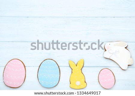 Easter gingerbread cookies on wooden table
