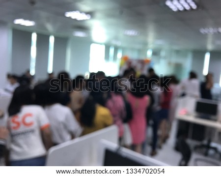 Royalty high quality free stock photo of abstract blur and defocused of the staff in the modern office. They are celebrating new products, gaining the first million customers/ users, technology compan