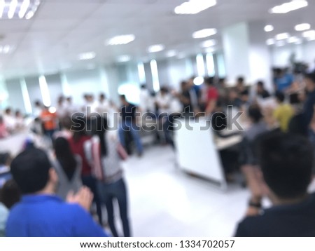 Royalty high quality free stock photo of abstract blur and defocused of the staff in the modern office. They are celebrating new products, gaining the first million customers/ users, technology compan