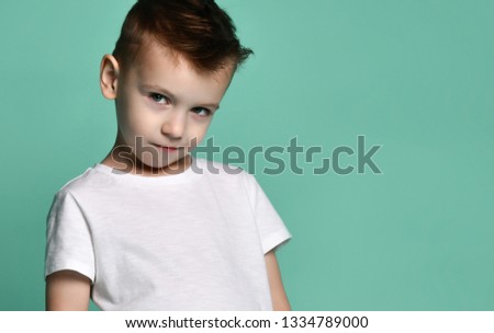 Portrait of happy joyful beautiful boy isolated on white background