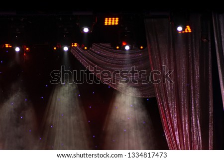 Theatrical scene without actors, scenic light and smoke
