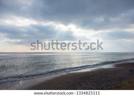 Beautiful view of the sea from a bird's eye view. The stunning cloudy sky reflected on the beach Fontanka, Odessa, Ukraina. Concept of leisure and sea travel.