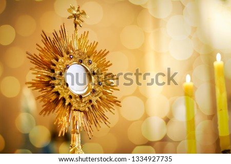 Ostensory for worship at a Catholic church ceremony - Adoration to the Blessed Sacrament - Catholic Church - Eucharistic Holy Hour Royalty-Free Stock Photo #1334927735