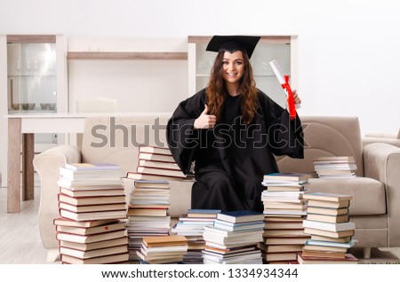 Young female student graduating from the university 