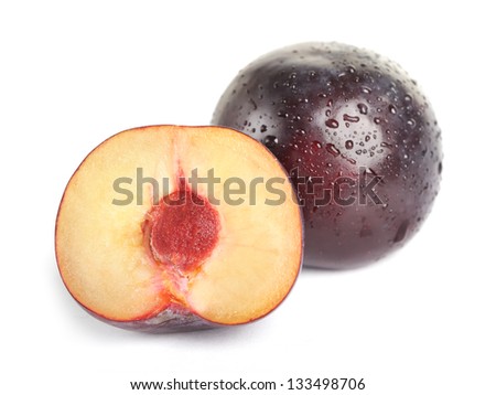 Plum fruit with dew isolated on white background