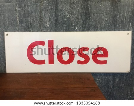 Shop closing sign