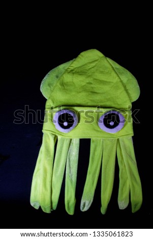 cute octopus on black background