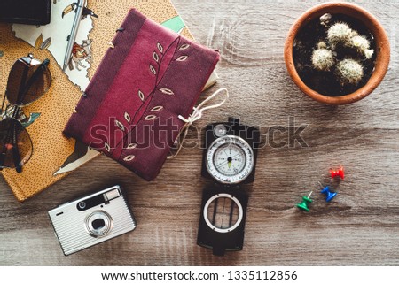 Top view of traveler accessories , Travel vacation trip background concept