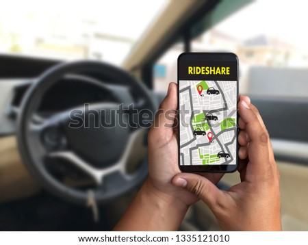 mobile application Ride share taxi service on phone man holding phone