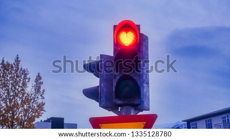 The red signal unique design in the heart shape for traffic light in Akureyri,Iceland