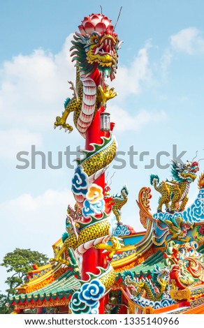 The Chinese dragon on pole of a chinese temple