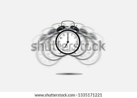 Time Management Concept : Retro black alarm clock alerting at seven o'clock on gray background.