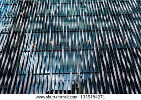Abstract architectural detail with futuristic metal wall design 
