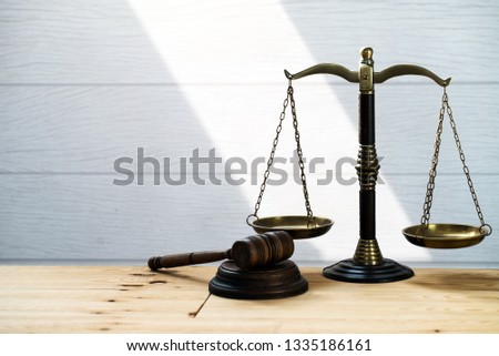  Justice Scales and wooden gavel . Justice concept
