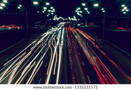 blurred night lights on the road in the Kyiv, Ukraine. abstract night background