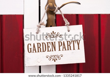 Wooden cardboard and chalkboard with garden party