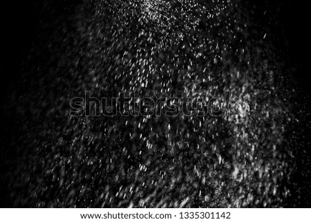 white powder color spreading effect for makeup artist or graphic design in black background