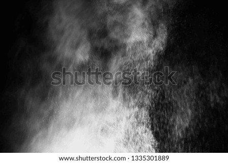 white powder color spreading effect for makeup artist or graphic design in black background