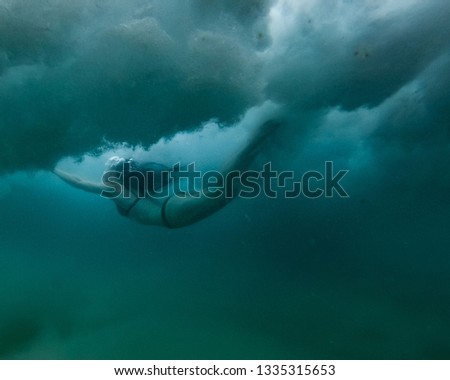 girl swimming underwater 6