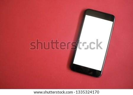 Mockup of smart phone on office desk