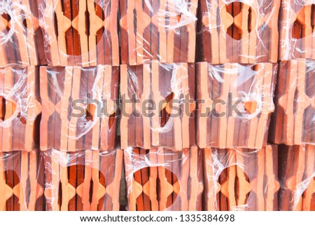 Clay tiles wrapped with plastic