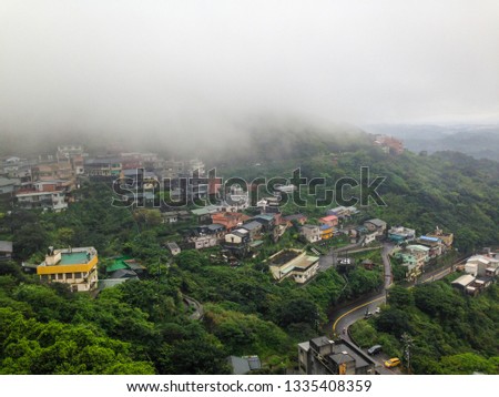 Jiufen in rainy day, here is a mountain town in northeastern Taiwan, east of Taipei. It's known for the narrow alleyways of its old town.