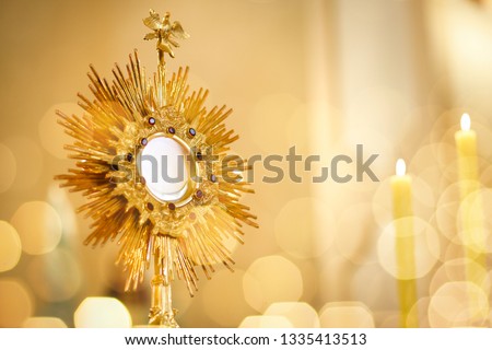 Ostensory for worship at a Catholic church ceremony - Adoration to the Blessed Sacrament - Catholic Church - Eucharistic Holy Hour Royalty-Free Stock Photo #1335413513