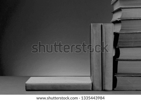 Vintage Books on Paper Background. White and Black Vintage Photo.