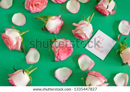 beautiful roses bunch and card for the best mom, mother's day concept, background