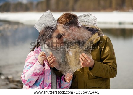 Love couple near lake in Altay mountines