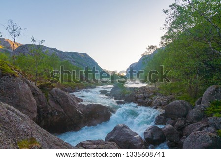 Amazing morning view of fast-flowing mountain river that becomes Manafossen Waterfall.  Gjesdal municipality in Rogaland county, Norway.