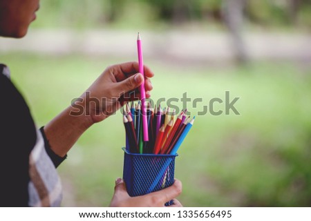 Hand and pencil pictures, green background color Education concept With copy space