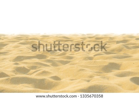 The beach sand texture in summer sun on white background