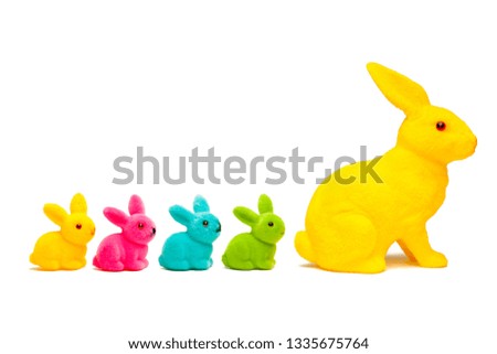 Easter bunny family isolated in front of white background