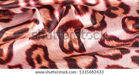 texture, background, pattern. silk fabric, tiger skin, light and silky soft, this atlas charmeuse is perfect for your projects - especially on bias. Colors include tan, black and brown.